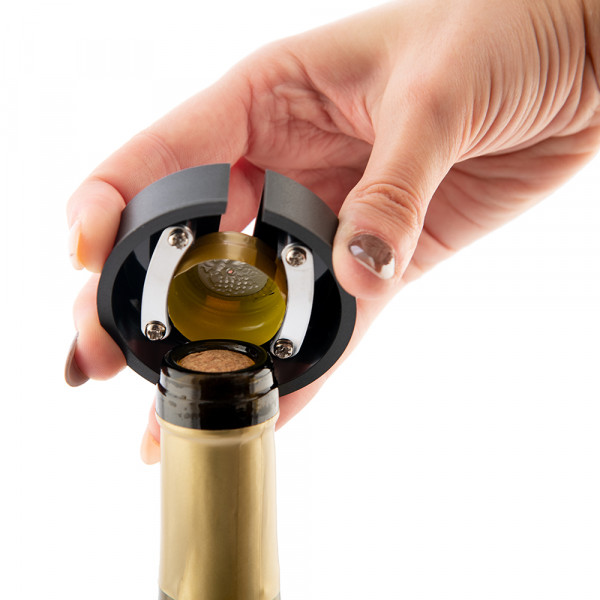 Coupe capsule pour bouteille de vin